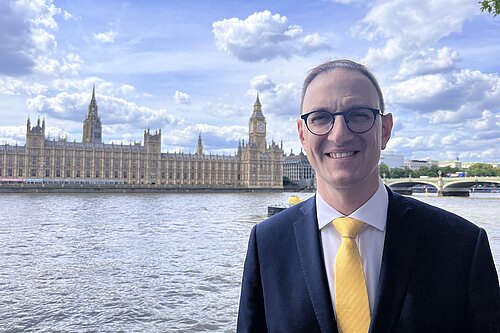 Ian Sollom across the river from the Palace of Westminster