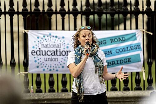 Cheney speaking at an NEU rally