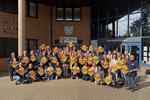 Liberal Democrats outside the council building 