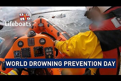 RNLI lifeboat at sea with the words 'world drowning prevention day'