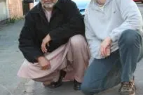 A delighted Sweetman Street resident shows Robin the new drain cover