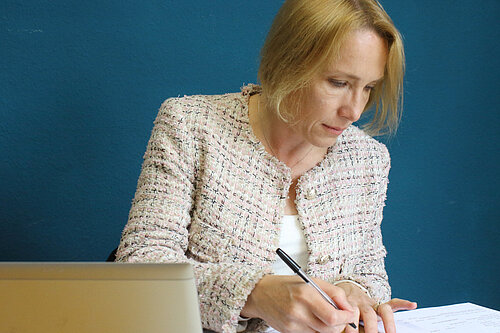 Helen at her desk